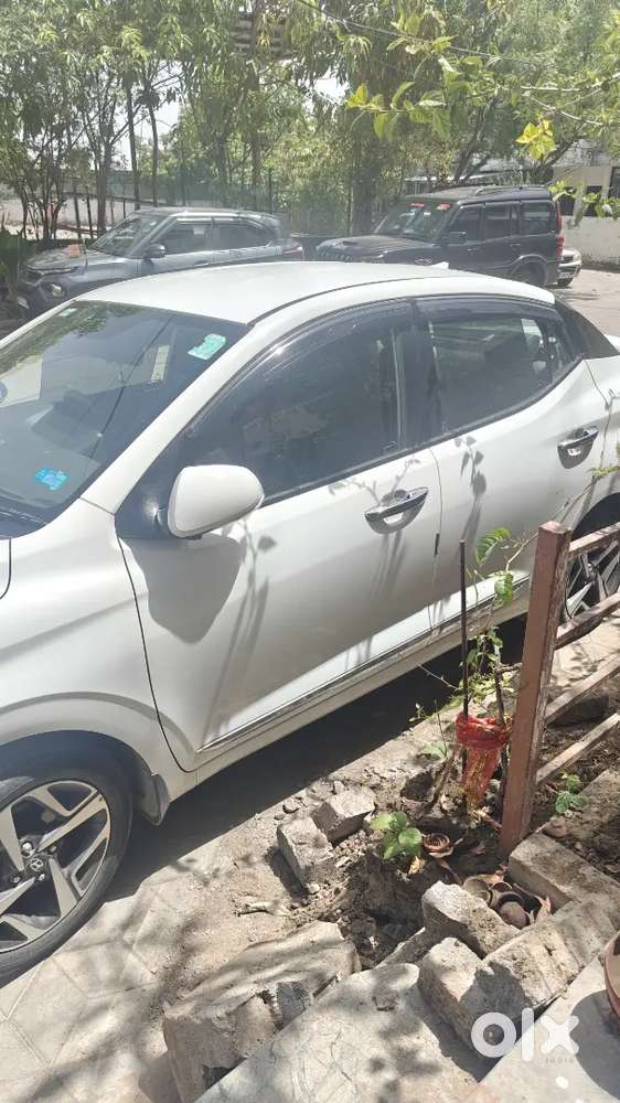 Hyundai Aura 2022 Petrol 41000 Km  Services Centre ,armrest,sunshades