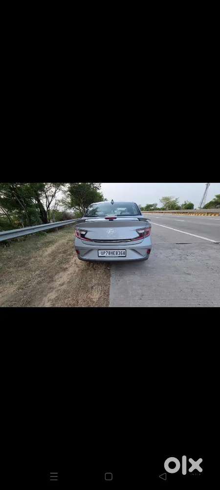 Hyundai Aura 2023 Cng & Hybrids 68000 Km Driven Top Modal