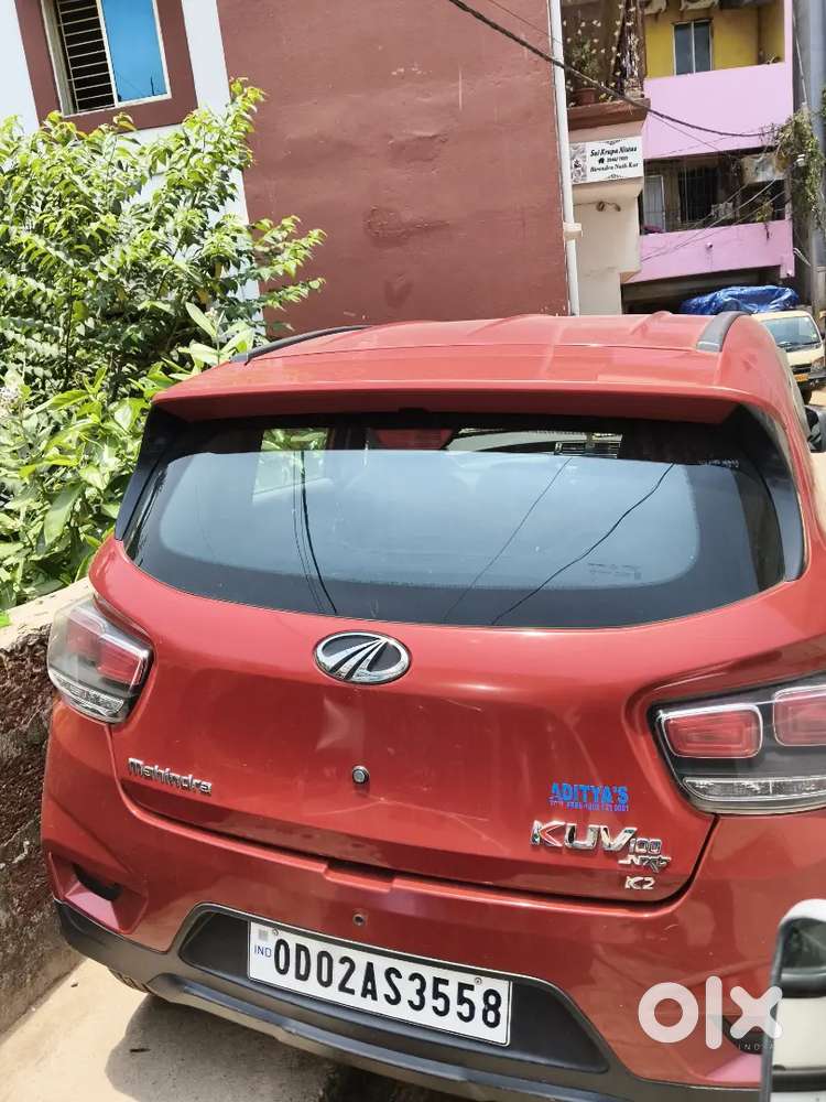 Well-maintained 2018 Mahindra Kuv100 K2 (red)