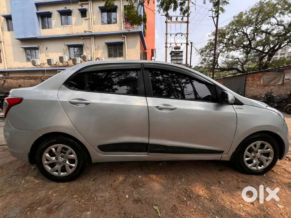 Hyundai Xcent 2014 Tax 2029