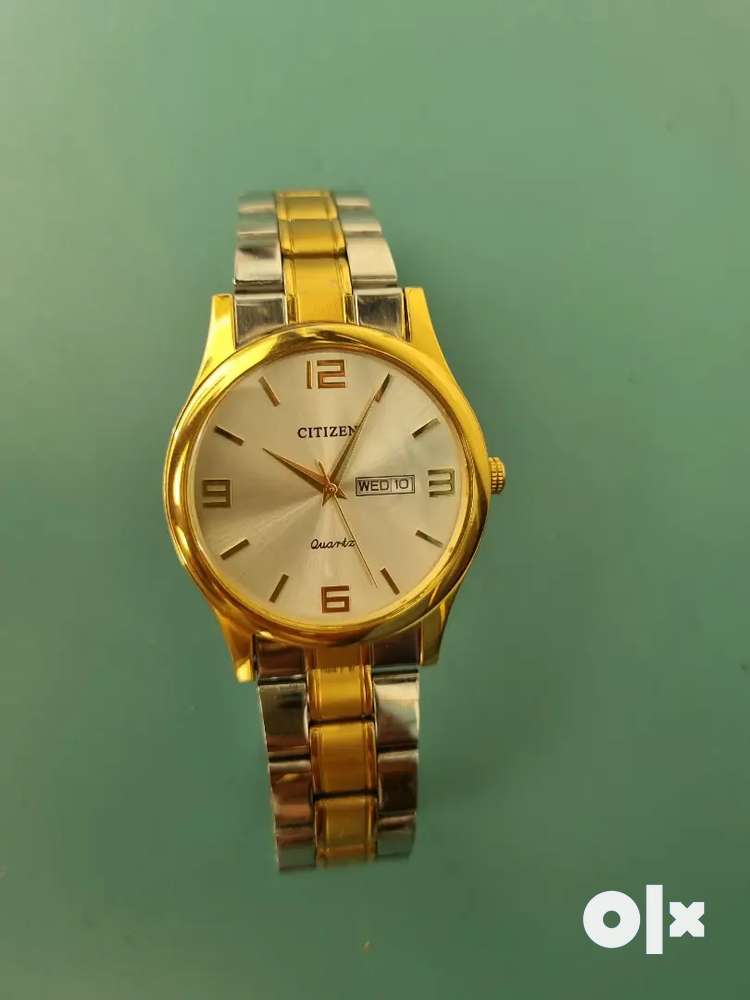 Golden wrist watch discount price