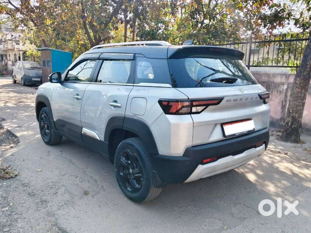 Maruti Suzuki Brezza 1.5 Zxi Plus Smart Hybrid Dual Tone, 2023, Petr..