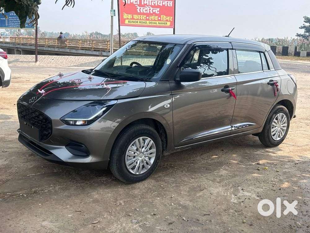 Maruti Suzuki Swift 1.2 Lxi (o), 2024, Petrol