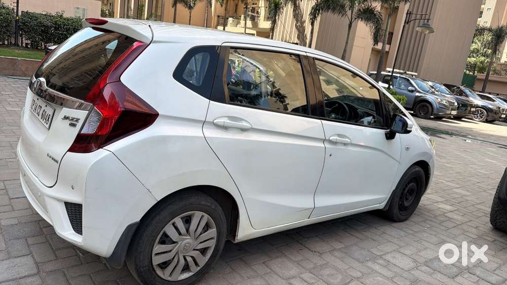 White Honda Jazz Available For Immediate Selling