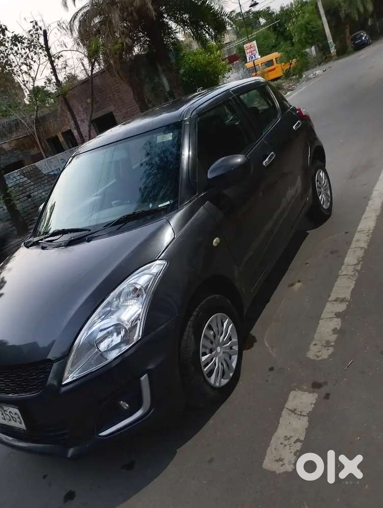 Swift 2016 Model Vxi Metalic Grey Ist Owner Showroom Condition