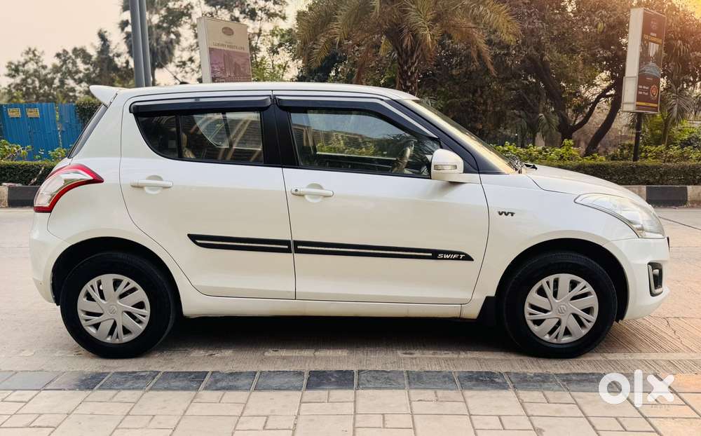 Maruti Suzuki Swift 1.2 Vxi (o), 2015, Petrol