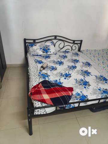 Iron cot 2024 double bed