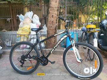 Btwin store orange bike