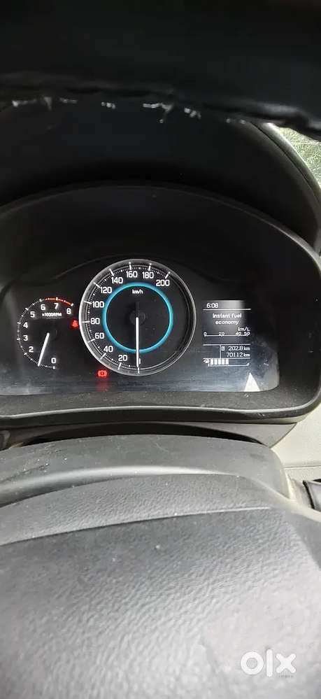 Features, Key Less Entry, Alloy Wheel, Music System