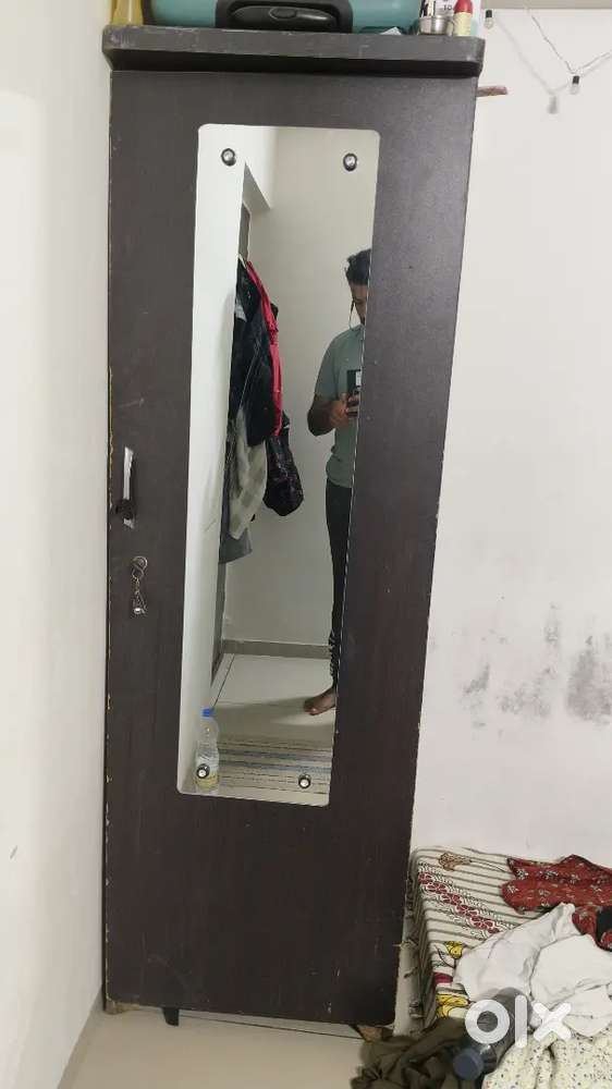 Spacious Cupboard with lockable drawer and mirror