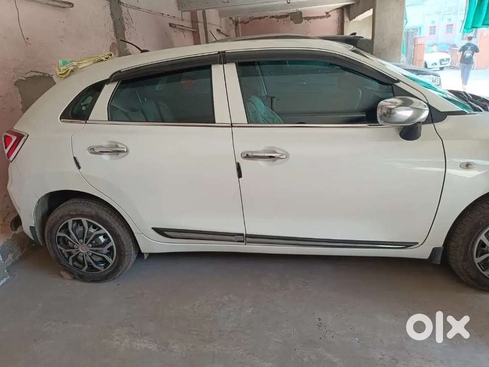 2024 Maruti Suzuki Baleno Sigma &ndash; White &ndash; First Owner