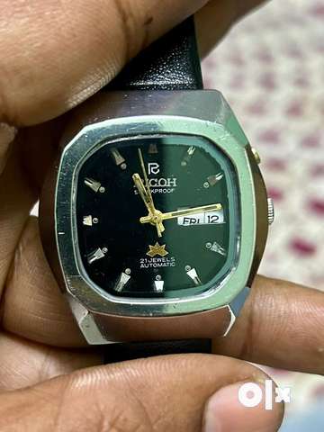 Ricoh watch olx hotsell