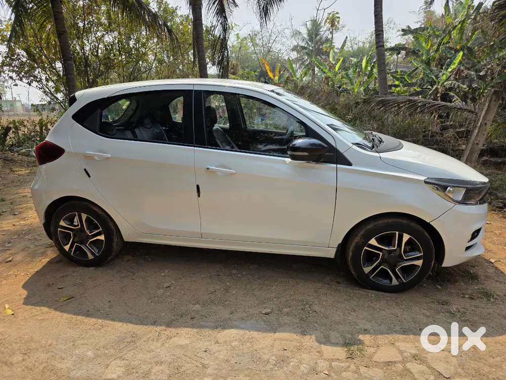 Tata Tiago Xz Plus Top Model With Very Well Maintained.