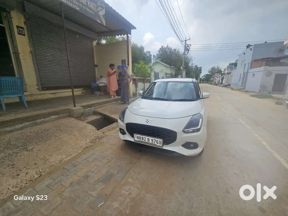 Maruti Suzuki Swift Vxi  Optional 2024