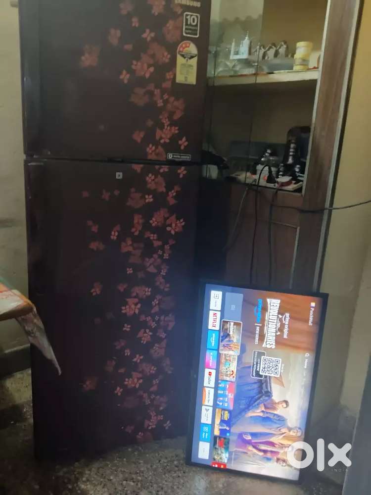 Its Mi 32 Android TV excellent condition and Samsung 320 D.Door fridge