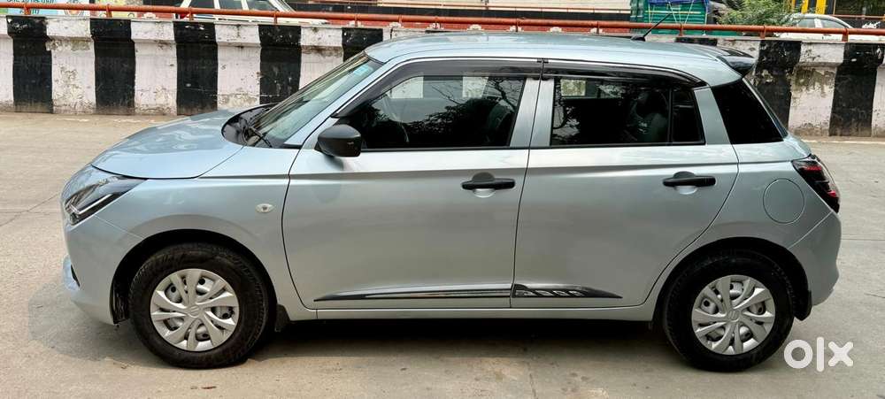 Maruti Suzuki Swift 1.2 Lxi (o), 2024, Petrol