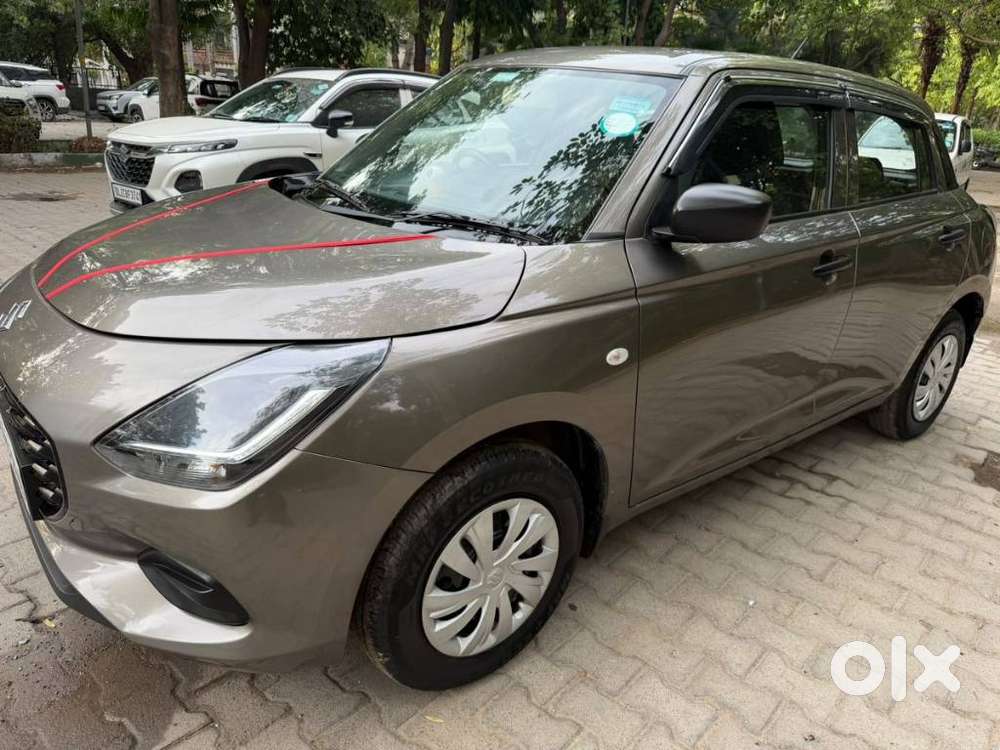 Maruti Suzuki Swift 1.2 Lxi (o), 2024, Petrol