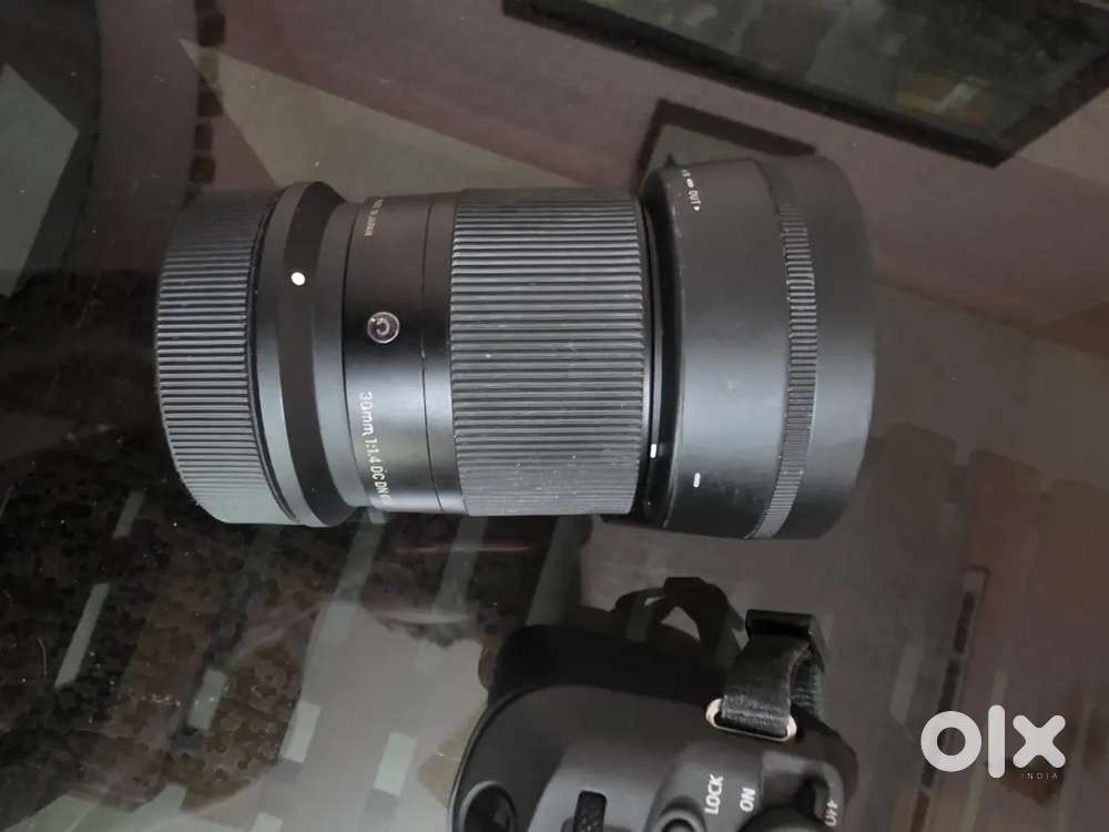 Canon r10 with kit lens with sigma rf lens 30mm