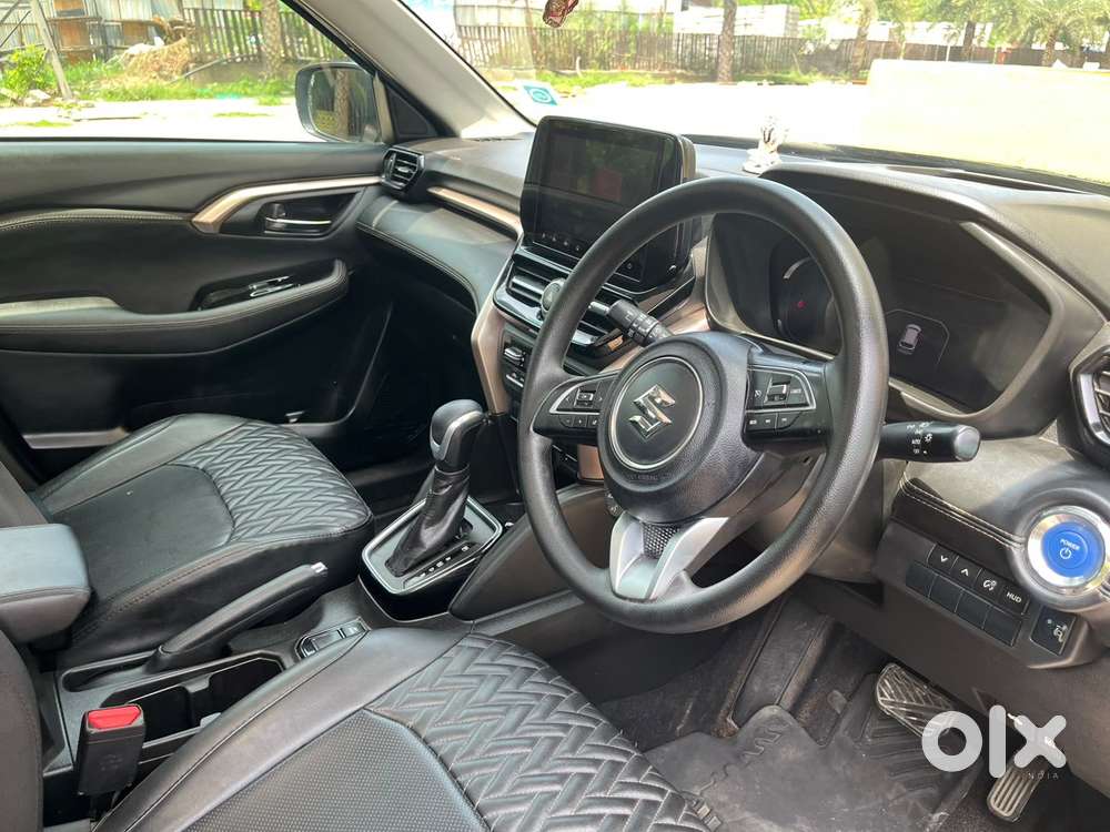 Maruti Suzuki Grand Vitara 1.5 Zeta Plus Dual Tone Intelligent Hybri..