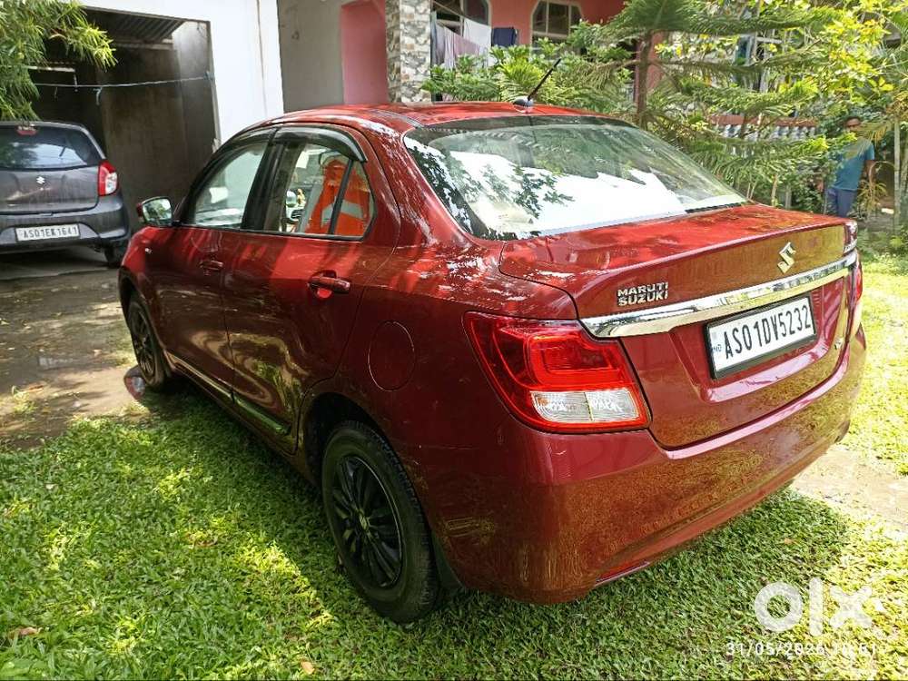 Maruti Suzuki Dzire ( Gallant Red). First Owner