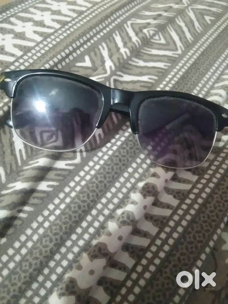 Purple tinted black sunglasses