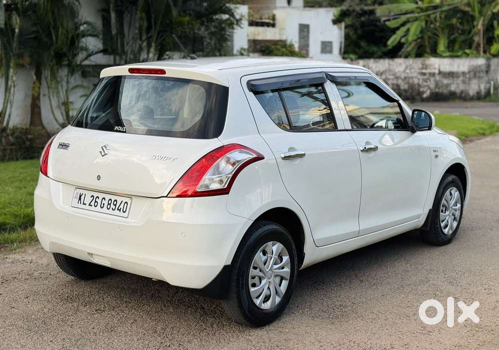 Maruti Suzuki Swift 1.2 Lxi (o), 2016, Petrol