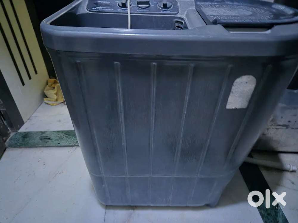 Grey coloured whirlpool washing machine