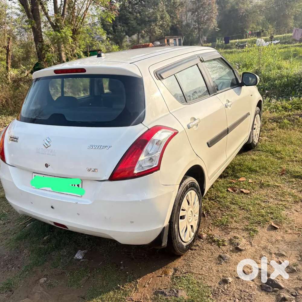 Swift 1.2 Star Vxi 2014 Km Driven
