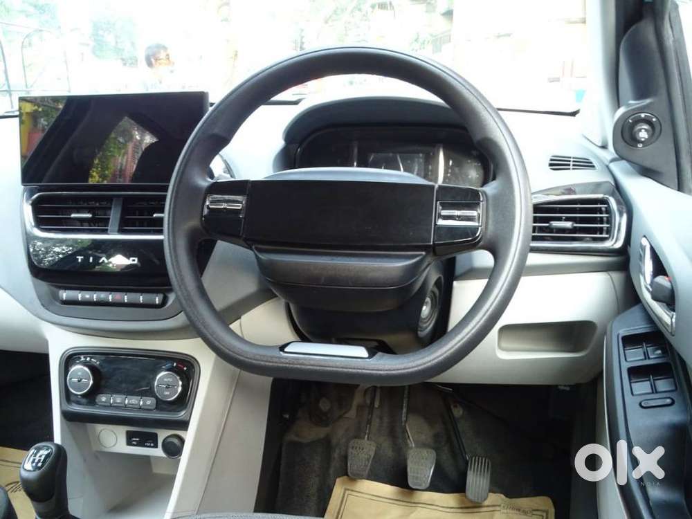 Tata Tiago 1.05 Revotorq Xz Plus Dualtone, 2025, Petrol