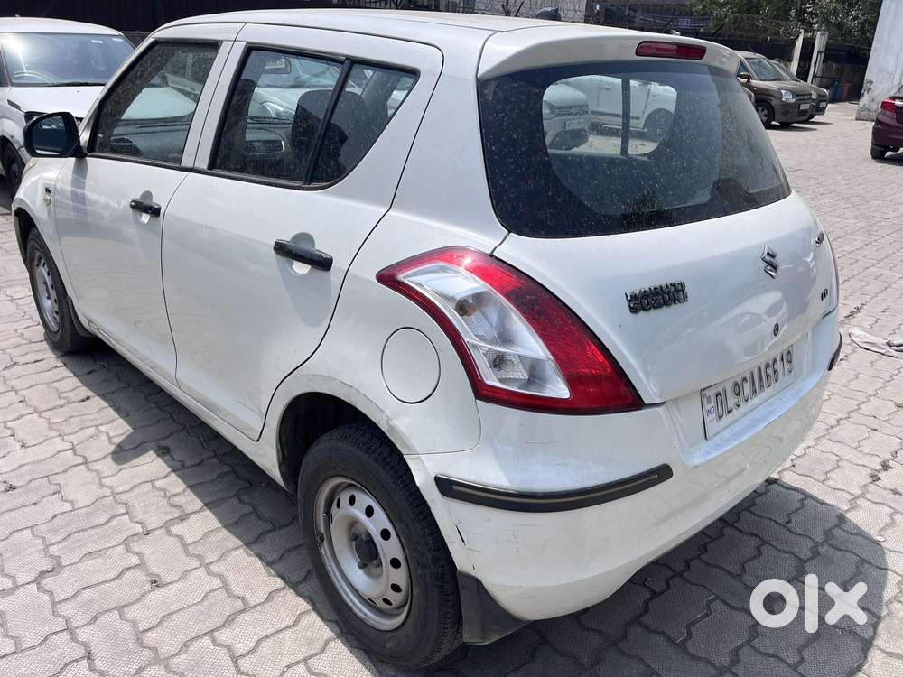 Maruti Suzuki Swift 1.2 Lxi (o), 2014, Petrol