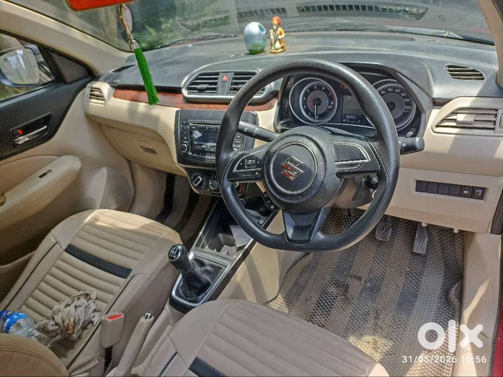 Maruti Suzuki Dzire ( Gallant Red). First Owner