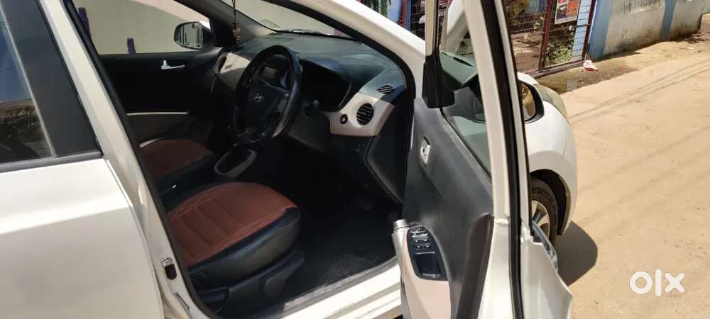 White Hyundai Xcent 2015 Petrol. Automatic Transmission.good Condition