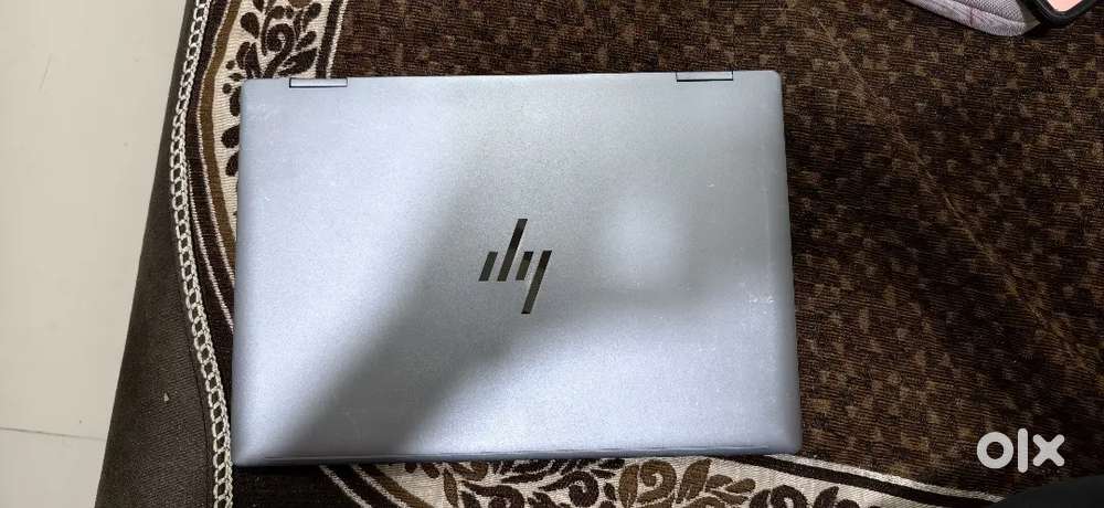HP ENVY 2 IN 1 LAPTOP with original box and charger ,bill and pen