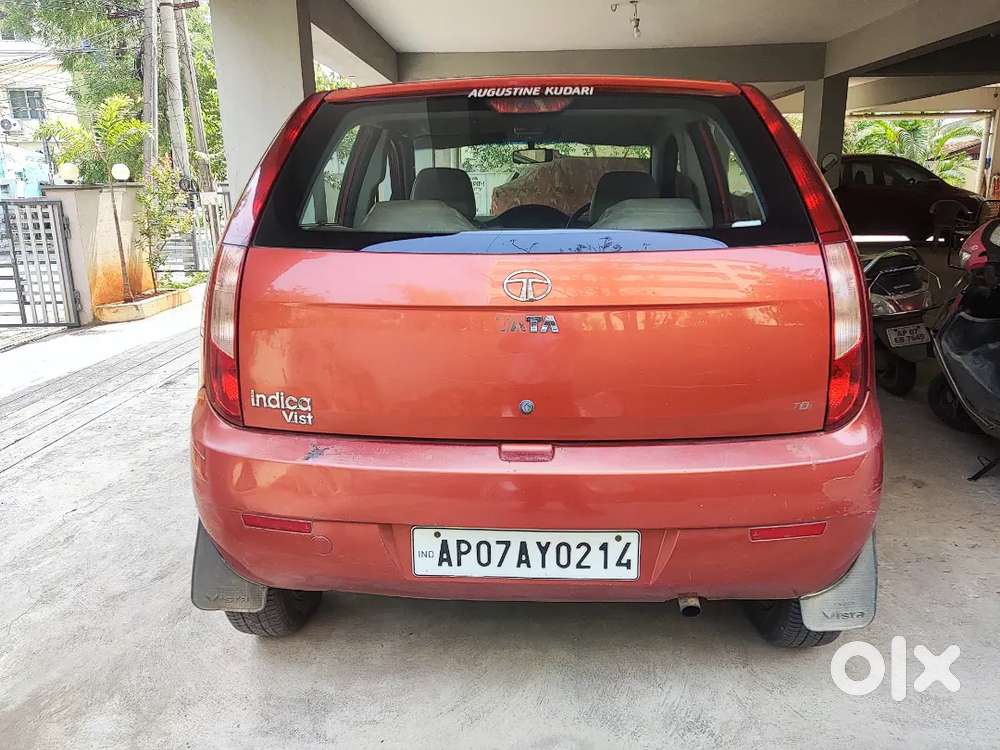 Tata Indica Vista Aura Tdi Ls - Solar Orange Colour