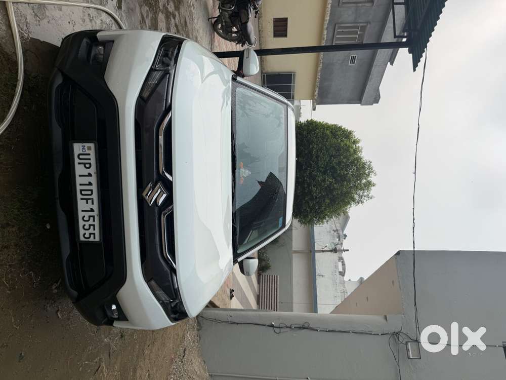 Maruti Suzuki Brezza Vxi At 2025