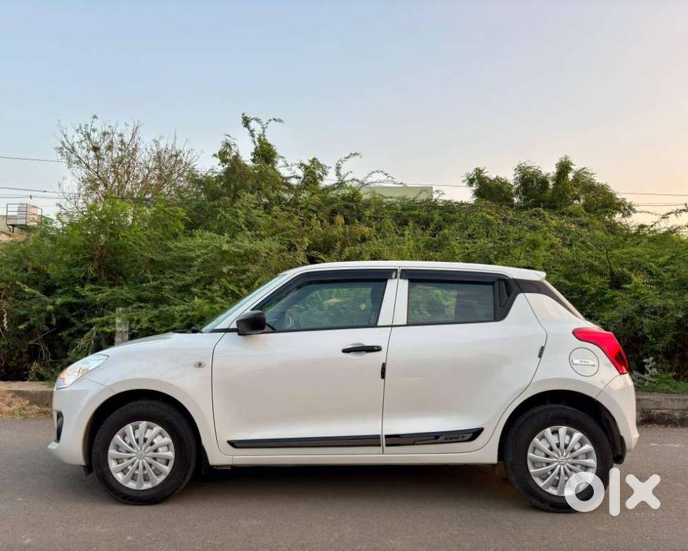 Maruti Suzuki Swift Lxi Optional-o, 2022, Petrol