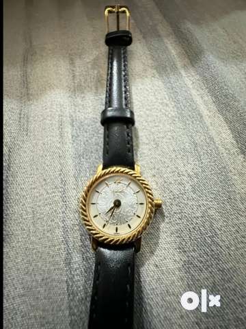 Titan nebula 18k gold on sale watches