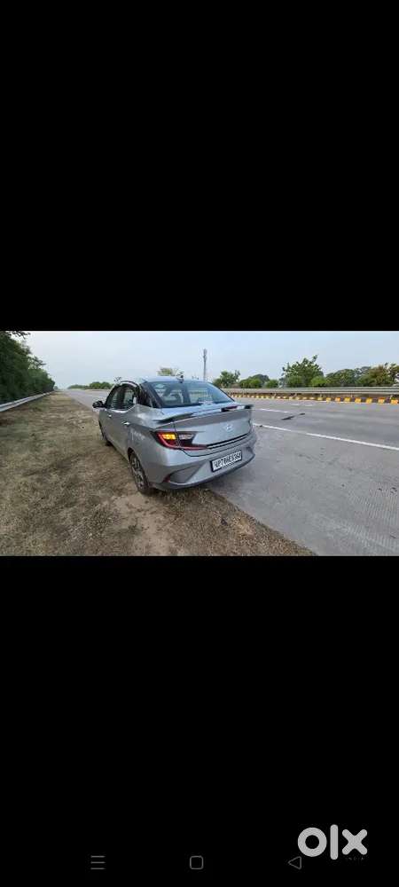 Hyundai Aura 2023 Cng & Hybrids 68000 Km Driven Top Modal