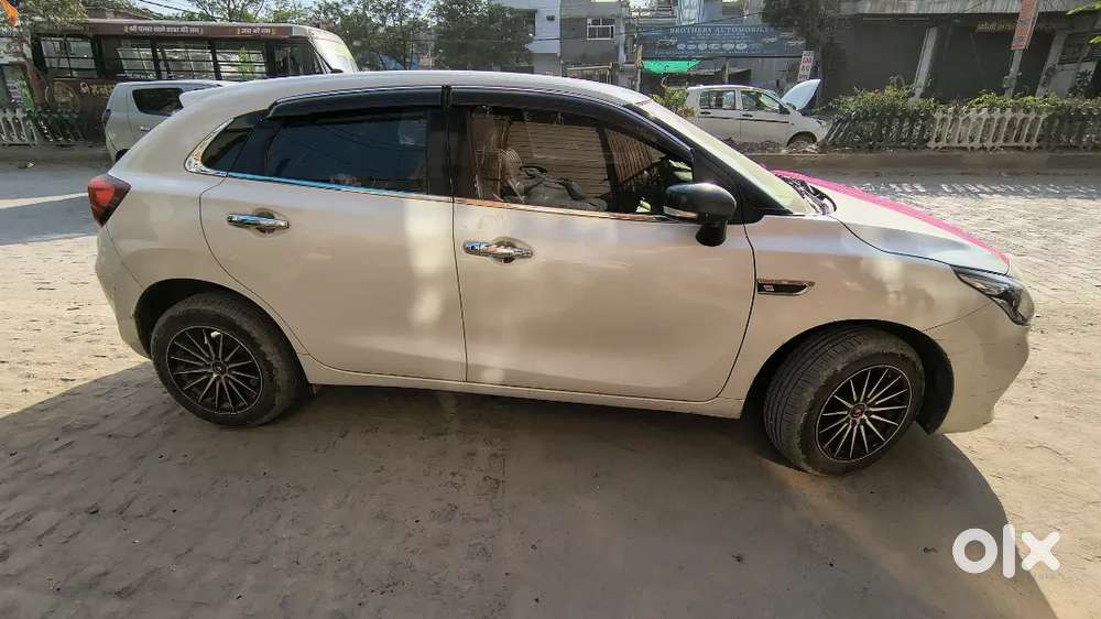 Baleno 2023 Petrol 1st Owner White Alloy Wheels Led Light Music System