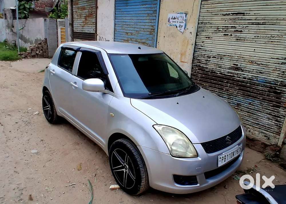 Maruti Suzuki Swift Lxi 2011