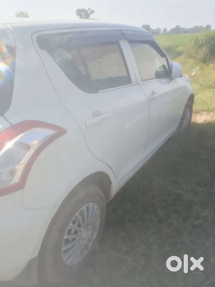 Maruti Suzuki Swift 2015 Lxi Option