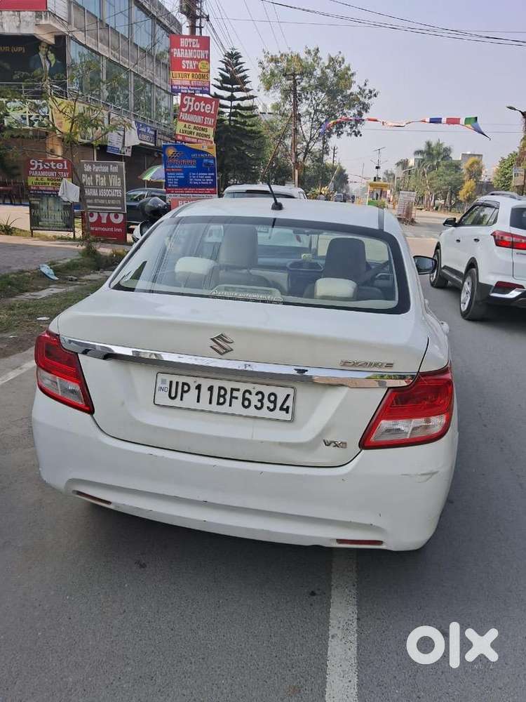 Maruti Swift Dzire 2017 Lxi Manual  White  40,000 Km  Single Owner
