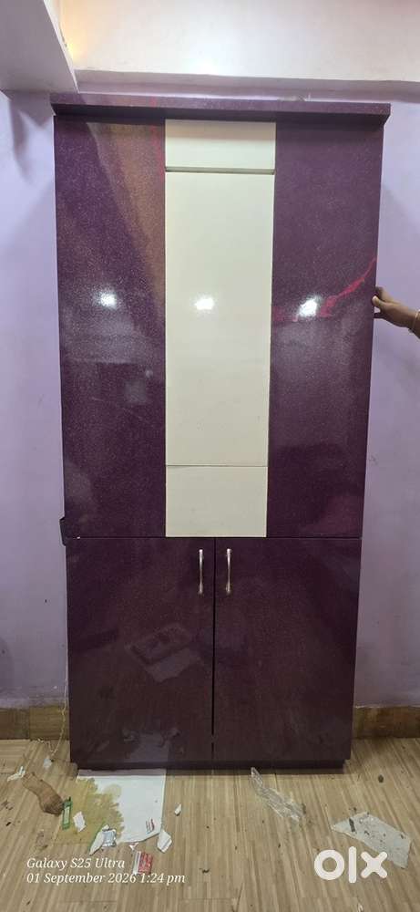 Folding table with storage for bottles snd gladsed