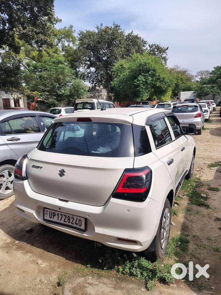 Maruti Suzuki Swift 1.2 Lxi (o), 2024, Petrol