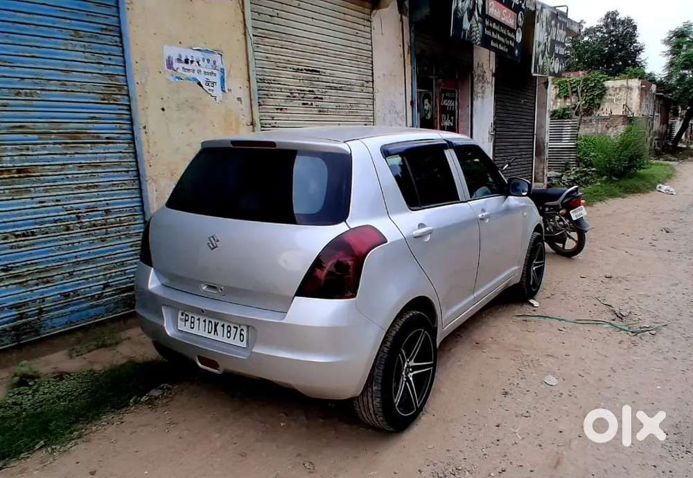 Maruti Suzuki Swift Lxi 2011