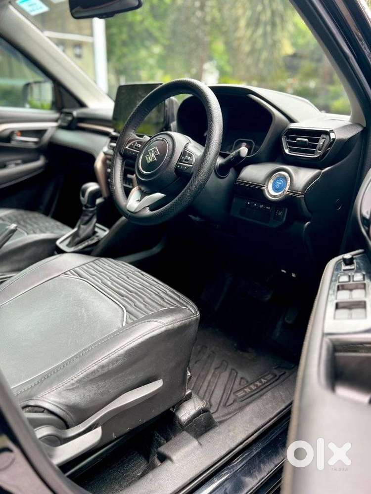 Maruti Suzuki Grand Vitara 1.5 Zeta Plus Dual Tone Intelligent Hybri..