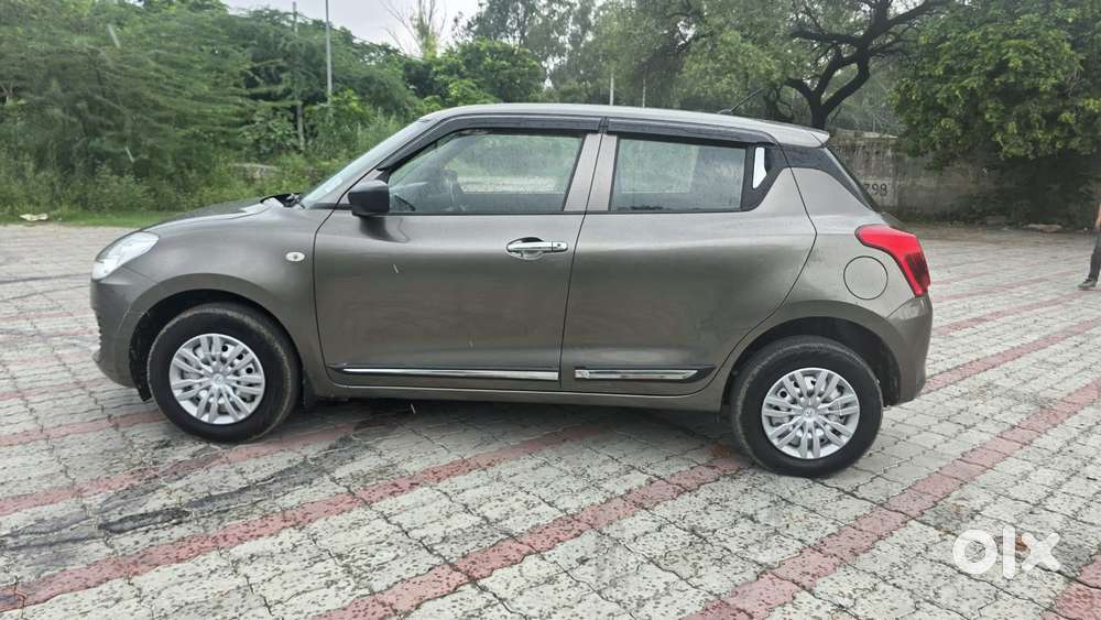 Maruti Suzuki Swift 1.2 Lxi (o), 2023, Petrol