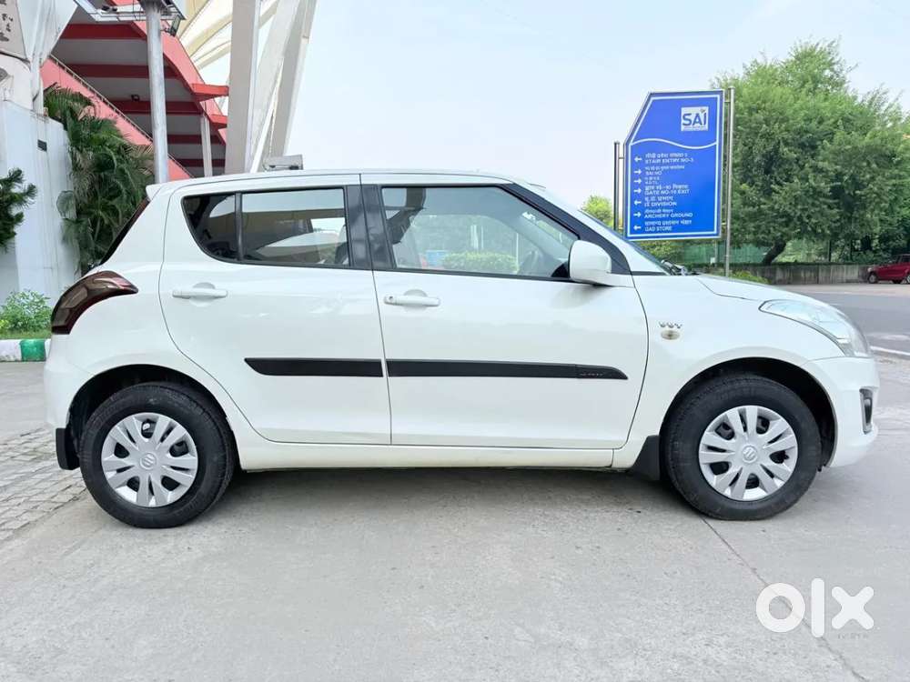 Maruti Suzuki Swift Lxi Optional-o, 2016, Petrol