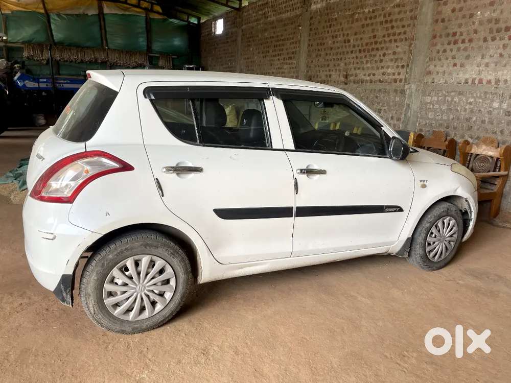 Swift 1.2 Lxi 2016 Petrol 140000 Km