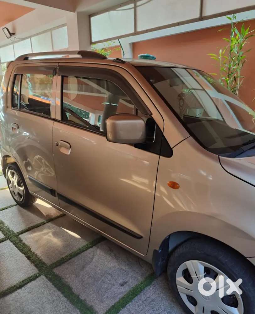 Wagon R Vxi Low Km Fancy Number Single Owner Golden Colour